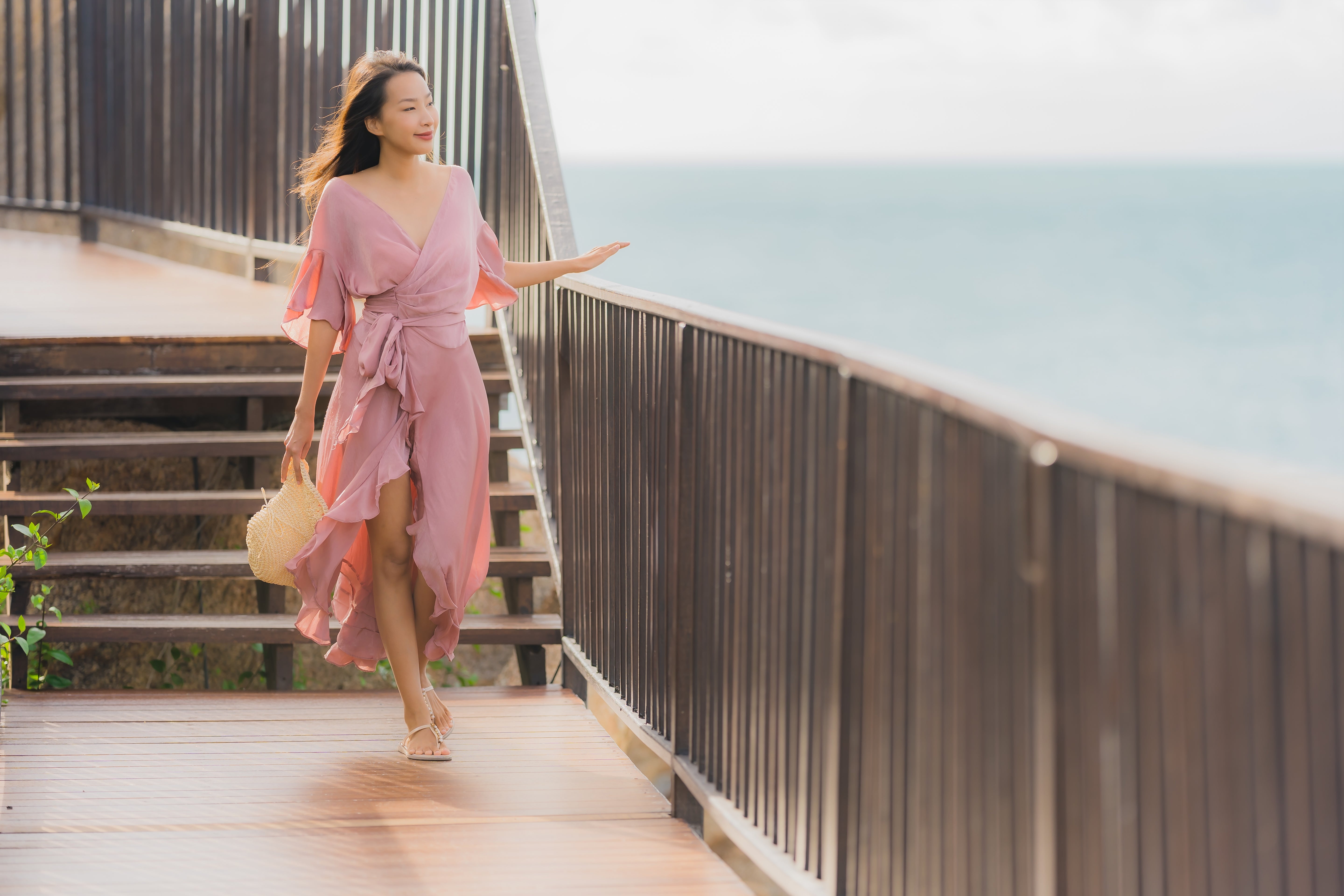 portrait-beautiful-young-asian-woman-looking-sea-beach-ocean-relax-holiday-vacation-travel.jpg