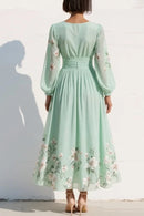 Elaria – Graceful Floral Pleated Maxi Dress